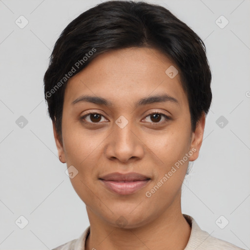 Joyful latino young-adult female with short  black hair and brown eyes