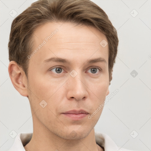 Neutral white young-adult male with short  brown hair and grey eyes