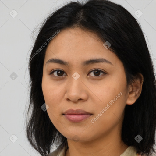 Joyful asian young-adult female with medium  brown hair and brown eyes