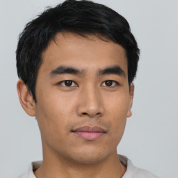 Neutral asian young-adult male with short  black hair and brown eyes