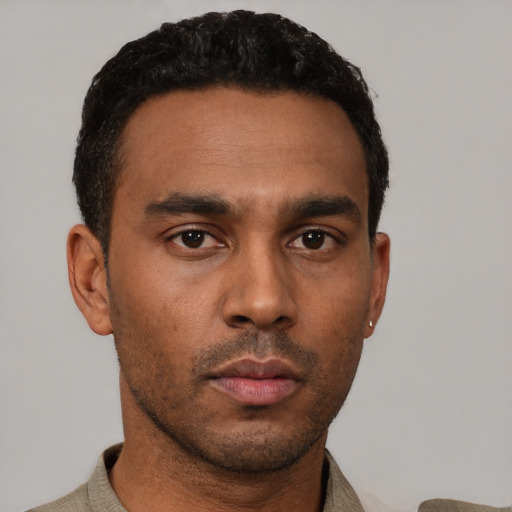 Neutral latino young-adult male with short  black hair and brown eyes