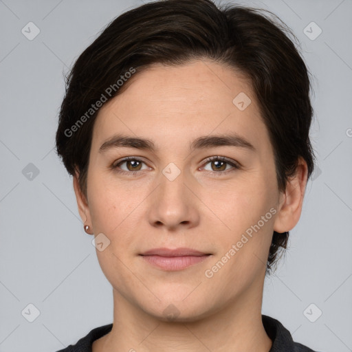 Joyful white young-adult female with short  brown hair and brown eyes