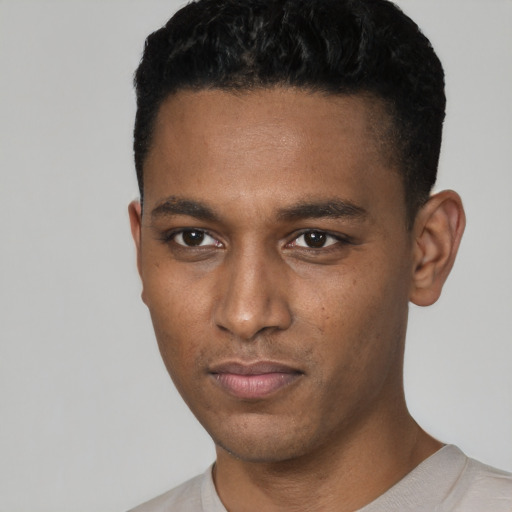 Neutral black young-adult male with short  black hair and brown eyes