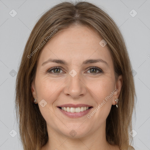 Joyful white adult female with medium  brown hair and grey eyes