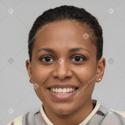 Joyful black young-adult female with short  brown hair and brown eyes