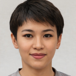 Joyful asian young-adult female with short  brown hair and brown eyes