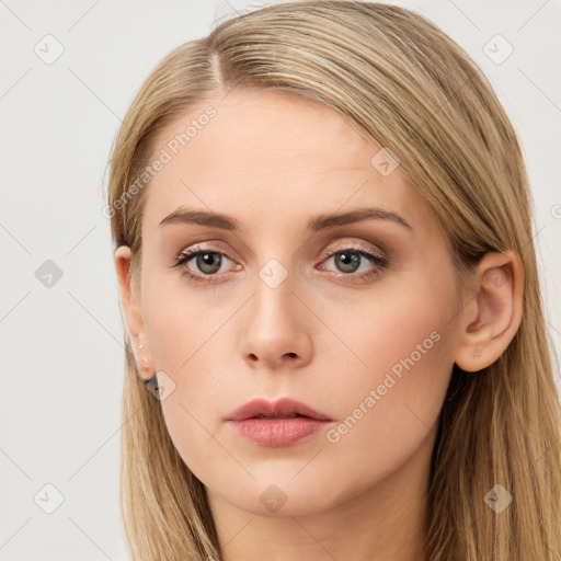 Neutral white young-adult female with long  brown hair and brown eyes