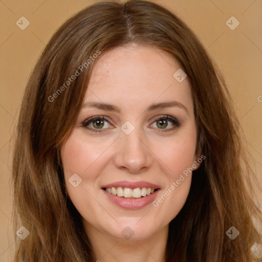 Joyful white young-adult female with long  brown hair and green eyes