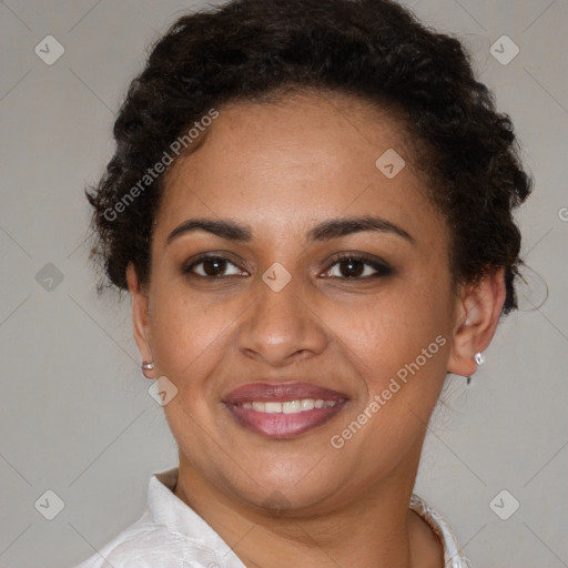 Joyful latino young-adult female with short  brown hair and brown eyes