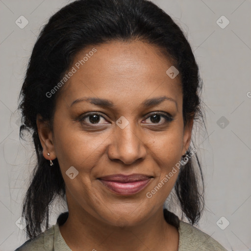 Joyful black adult female with medium  brown hair and brown eyes