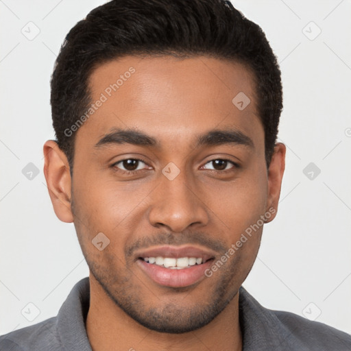 Joyful latino young-adult male with short  brown hair and brown eyes