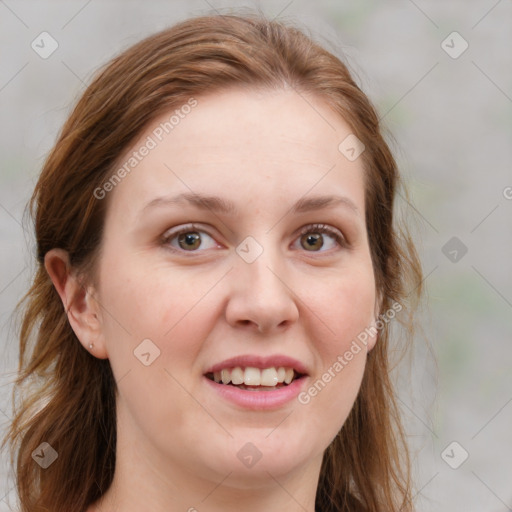 Joyful white young-adult female with medium  brown hair and blue eyes