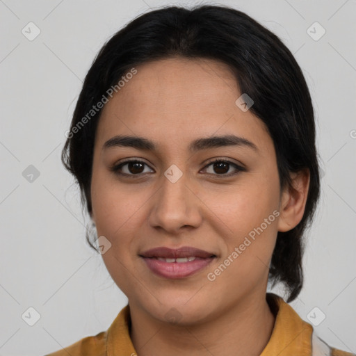 Joyful latino young-adult female with medium  black hair and brown eyes