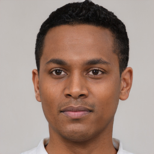 Neutral black young-adult male with short  black hair and brown eyes