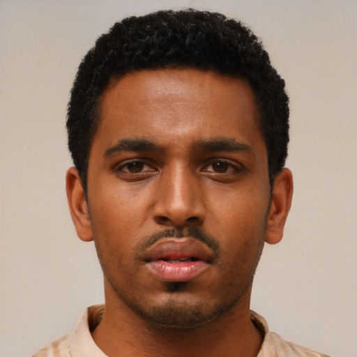Neutral black young-adult male with short  black hair and brown eyes