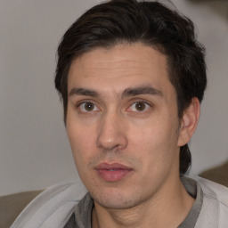 Neutral white adult male with short  brown hair and brown eyes