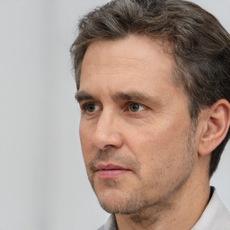 Neutral white adult male with short  brown hair and brown eyes