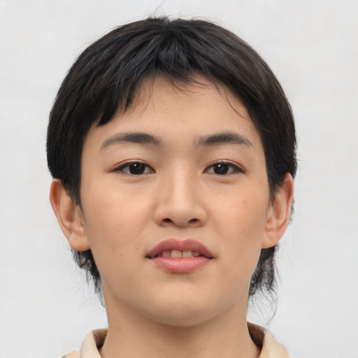 Joyful asian young-adult female with medium  brown hair and brown eyes