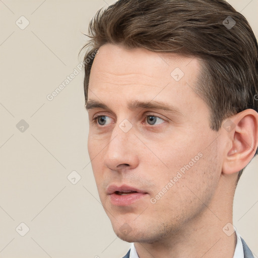 Neutral white young-adult male with short  brown hair and brown eyes