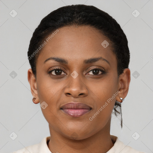 Joyful black young-adult female with short  black hair and brown eyes