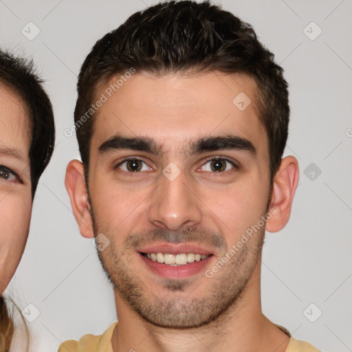 Joyful white young-adult male with short  brown hair and brown eyes