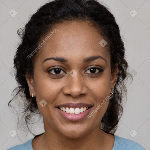 Joyful black young-adult female with medium  brown hair and brown eyes