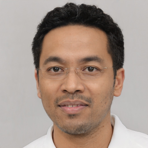 Neutral asian adult male with short  black hair and brown eyes
