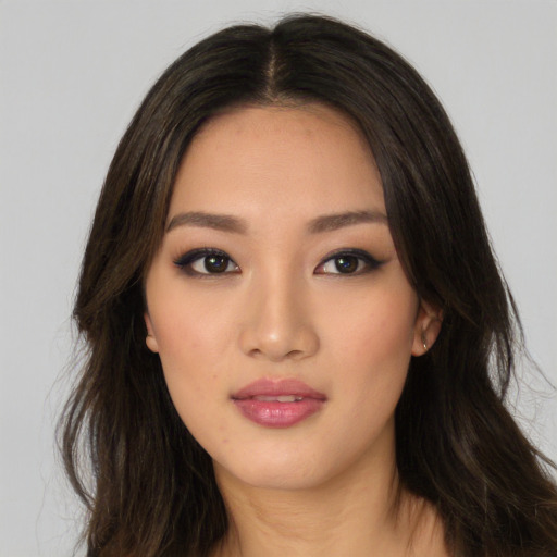 Neutral asian young-adult female with long  brown hair and brown eyes