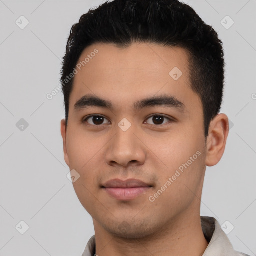 Neutral latino young-adult male with short  black hair and brown eyes