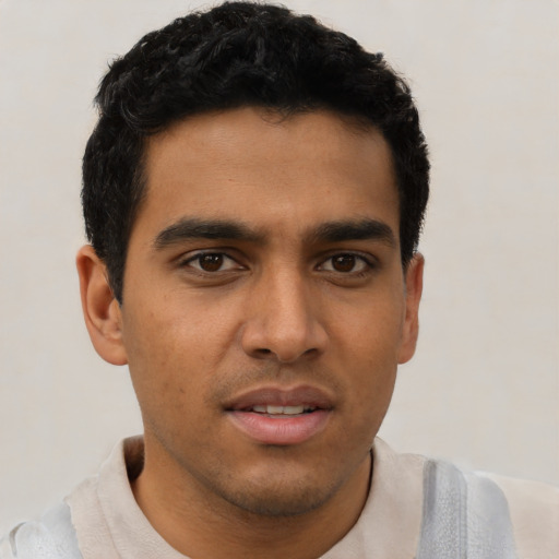 Neutral latino young-adult male with short  brown hair and brown eyes