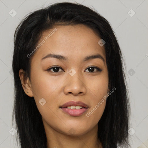 Joyful asian young-adult female with long  brown hair and brown eyes