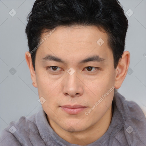 Neutral asian young-adult male with short  brown hair and brown eyes