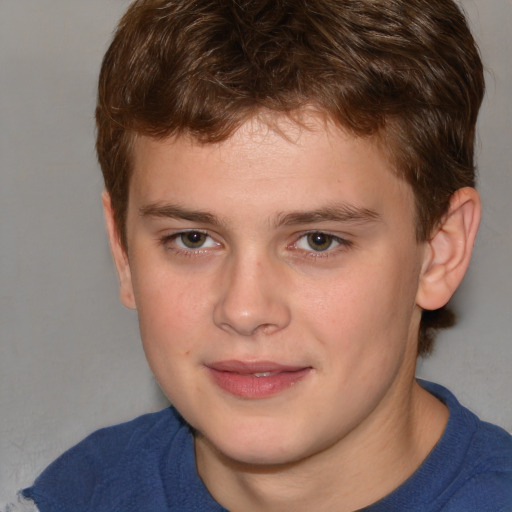 Joyful white child male with short  brown hair and brown eyes