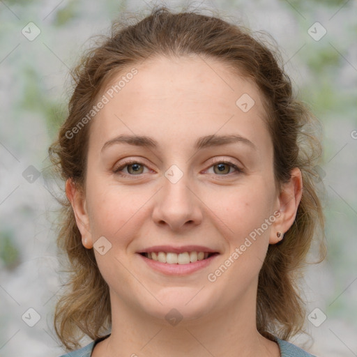 Joyful white young-adult female with medium  brown hair and blue eyes