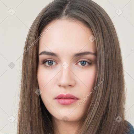 Neutral white young-adult female with long  brown hair and brown eyes