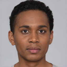 Neutral black young-adult male with short  brown hair and brown eyes