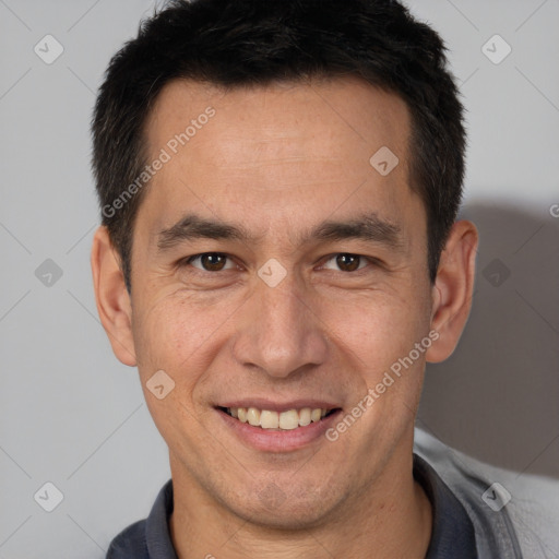 Joyful white adult male with short  brown hair and brown eyes