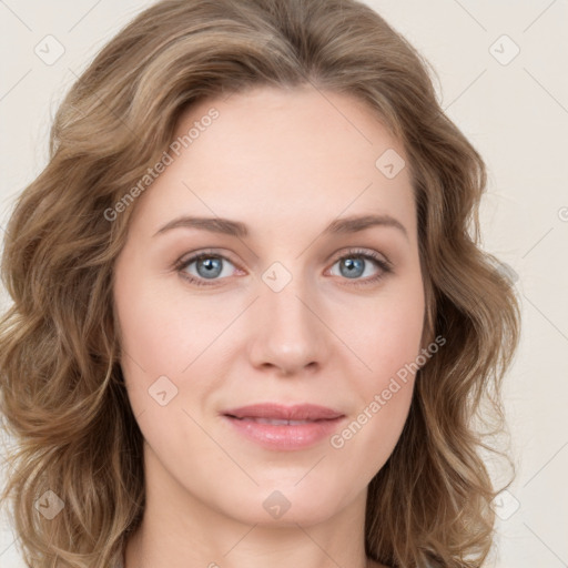 Joyful white young-adult female with long  brown hair and green eyes