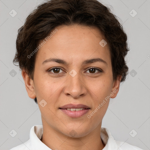 Joyful white adult female with short  brown hair and brown eyes