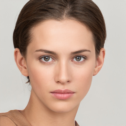 Neutral white young-adult female with short  brown hair and brown eyes