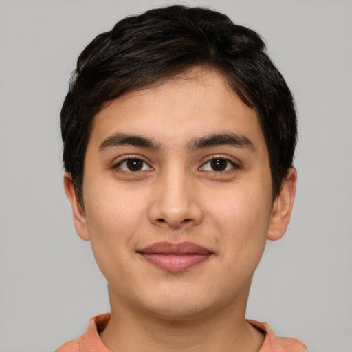 Joyful asian young-adult male with short  brown hair and brown eyes