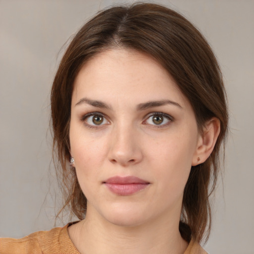 Neutral white young-adult female with medium  brown hair and brown eyes