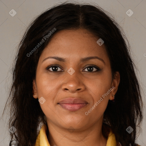 Joyful black young-adult female with long  brown hair and brown eyes