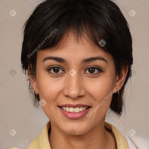 Joyful latino young-adult female with medium  brown hair and brown eyes