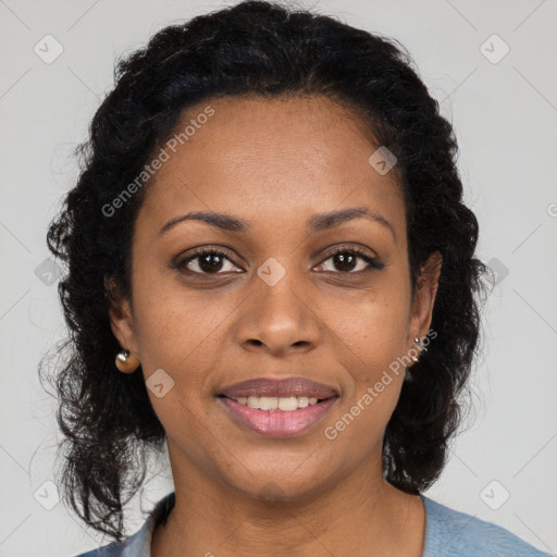 Joyful black young-adult female with medium  brown hair and brown eyes