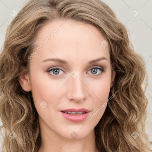 Joyful white young-adult female with long  brown hair and blue eyes