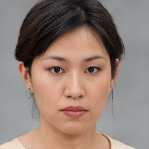 Neutral white young-adult female with medium  brown hair and brown eyes