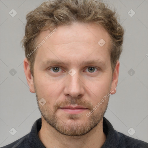 Neutral white adult male with short  brown hair and grey eyes