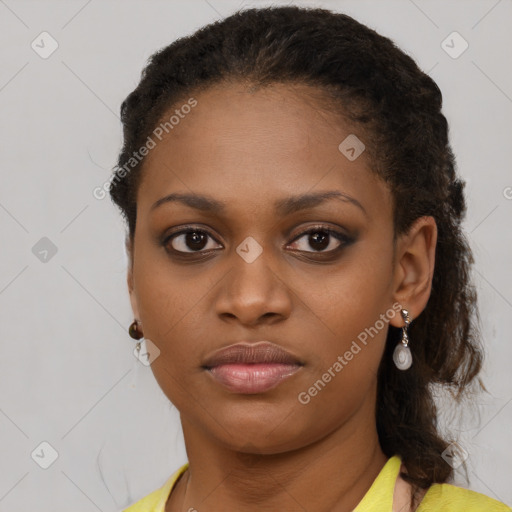 Neutral black young-adult female with long  brown hair and brown eyes