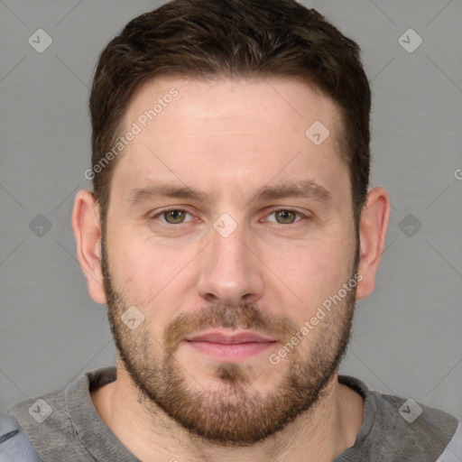 Joyful white adult male with short  brown hair and grey eyes